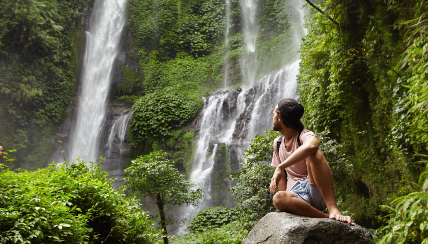 https://www.freepik.com/free-photo/tourism-travel-adventure-stylish-young-hipster-sitting-stone-with-bare-feet-turning-his-head-back-see-amazing-waterfall_9534207.htm#fromView=search&page=1&position=40&uuid=99873255-5b96-48a5-aa45-6aad1fa32341&query=Exploring+the+Highlands+of+Viti+Levu%3A+Hidden+Waterfalls